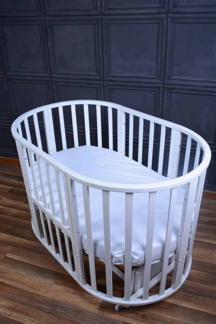 Кровать детская "Мирра" 6 в 1 универсальный маятник/колесо (белый)